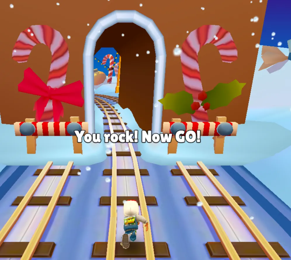 Subway Surfers festive level with candy cane decorations and a You rock Now GO motivation text